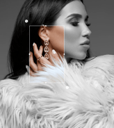 a woman with a white fur coat