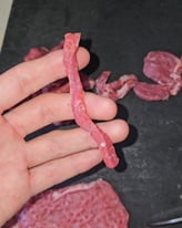 boeuf coupé dans une main