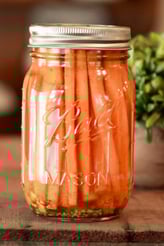 a jar of fermented carrots