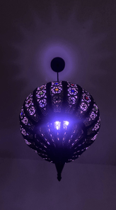 arabian lamp shining blue purple light