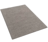 a white rug rug with a grey rug and a black background