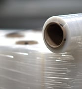 a roll - top plastic wrapper on a table