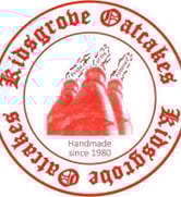 a red and white logo with a triangle shaped object