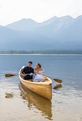 couple canoeing after eloping in jasper