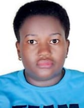 a woman in a blue shirt with a blue shirt