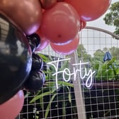 Forty neon sign on a circle backdrop for Violet's 40th birthday in Redland Bay.