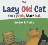 lazy old cat finds a pointy black hat rhyming picture book cover