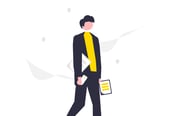 a man in a suit and tie is walking