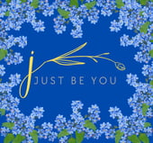 a blue and white floral wreath with the words just be you