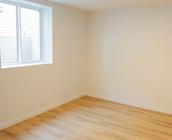 light wood colored flooring in bedroom