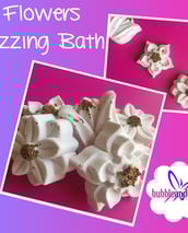a bunch of flowers that are bath bombs without harsh chemicals