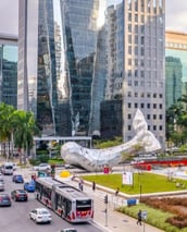 a city street scene with a bus and a bus