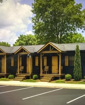 a picture of a row of houses with a black and white photo