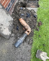 Broken gully pipe