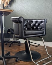 a Studio M Salon chair in downtown Clermont F