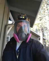 Inspector Felix in his PPE after inspecting a crawlspace at a home in Evergreen.