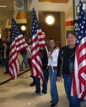 Veterans gathering at a community event, highlighting camaraderie and engagement.