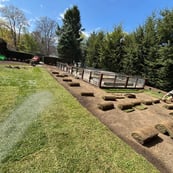 sod-being-laid-out-by-capstone-landscape-services-employees.jpg