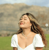 Kristie looking up to the sun.