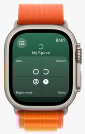 a smart watch with a bright orange strap