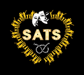 a theatre stage with a heart shaped sign that says,'sats