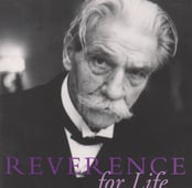 a man in a tuxedo suit and bow tie