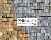 Stacked wooden pallets with the ZarPallets logo, highlighting packaging solutions.