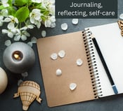 table with a journal and pencil on text reads journaling, reflecting, self-care