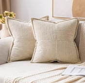 a couch with pillows and scatter cushions and accent pillows 