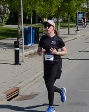 Photo of Karas Wright running during Calgary 1/2 marathon