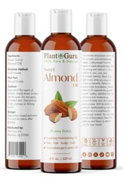 three bottles of sweet almond oil