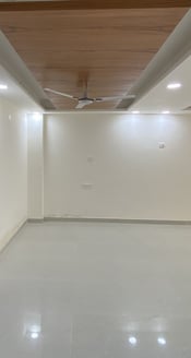 Spacious Living Room of 3 BHK Corner Builder Floor with Multiple Balconies — Chattarpur