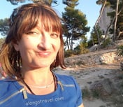 Alonga travel the author in Dubrovnik smiling happily about being there