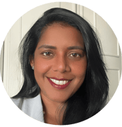 a woman with long black hair and a white shirt