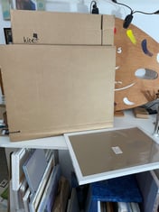 Telescopic boxes for framed prints.