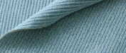 a close up of a blue and white ribbing fabric