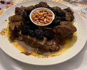 MOROCCO TOURS GASTRONOMY TOURS TEACHING SPECIAL DISHES INCULDING MEAT AND PRUNES AND ALMONDS TAJINE
