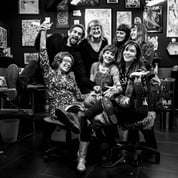a group of people posing for a photo