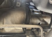 Starter motor inside a vehicle engine