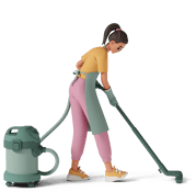 Professionnelle du nettoyage avec un aspirateur