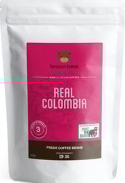 Paquet de café 'Brown Bear | Real Colombia' en grains entiers.