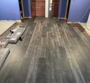 basement grey wooden floor installation