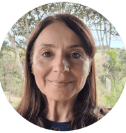 a woman with long hair and a blue dress