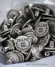 Metal buttons, zipper pulls, and clothing hardware with custom branding