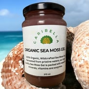 A jar of organic sea moss gel with a sea background