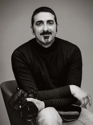 a man with a mustache and mustache mustaches on his face