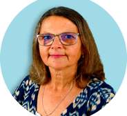 a woman in a blue dress and glasses
