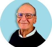 a man with glasses and a black sweater