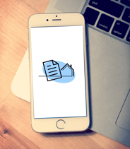 a cell phone with a paper clipping on it