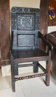 The chair at Steeple Ashton, dated 1656 and intricately carved with geometric designs